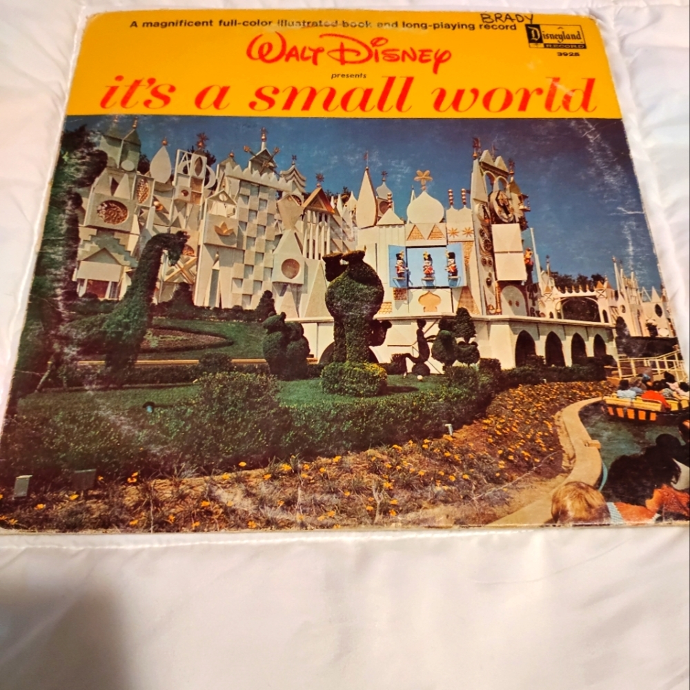 Walt Disney "It's a small world" vinyl and storybook.